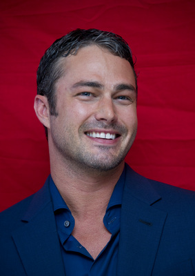 Taylor Kinney poster with hanger